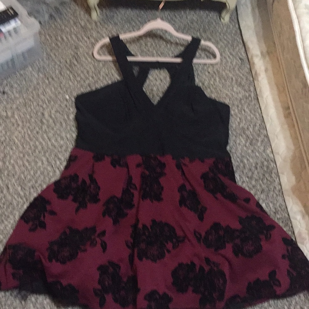 A Maroon and black prom dress